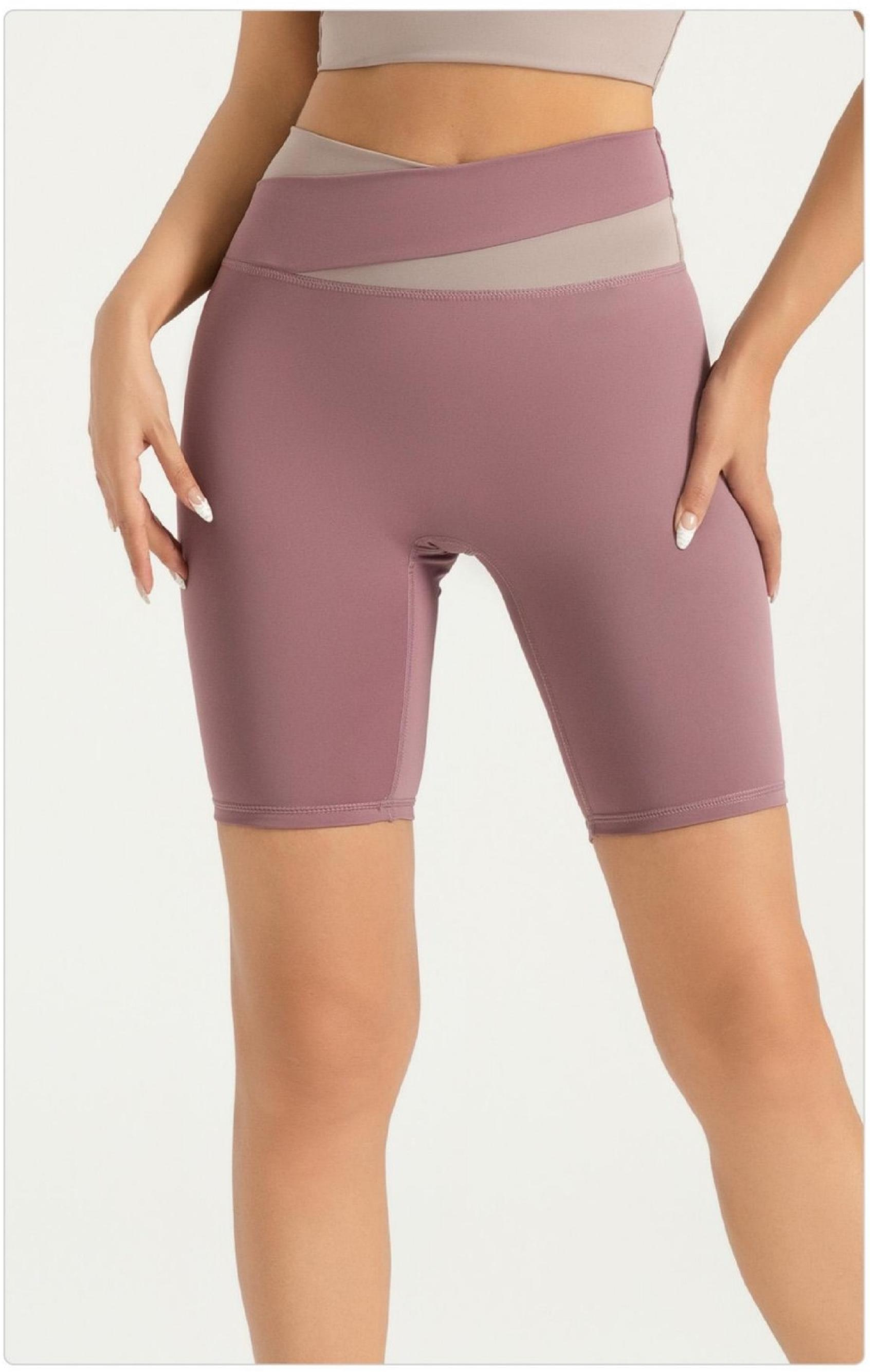 Peach-colored color-blocked shorts